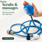 blue pet shower hose and glove coiled up for convenient storage and travel.