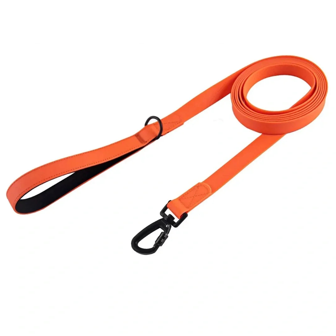 Bright orange waterproof long training leash coiled neatly with a comfortable hand loop and black locking carabiner.