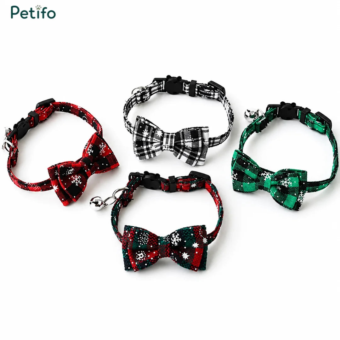 Assorted collection of red, black, white, and green plaid Christmas cat collars.