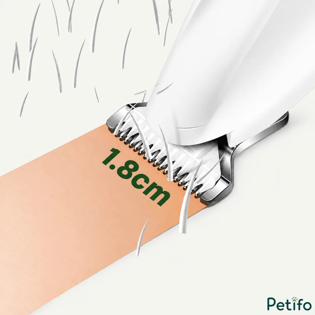 Close-up view of a pet grooming trimmer cutting hair smoothly against a skin-safe surface with 1.8cm blade width.