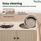 Demonstration of easy cleaning for the Petifo feeding station, showing removable stainless steel bowls with non-slip rims that wipe clean in seconds.