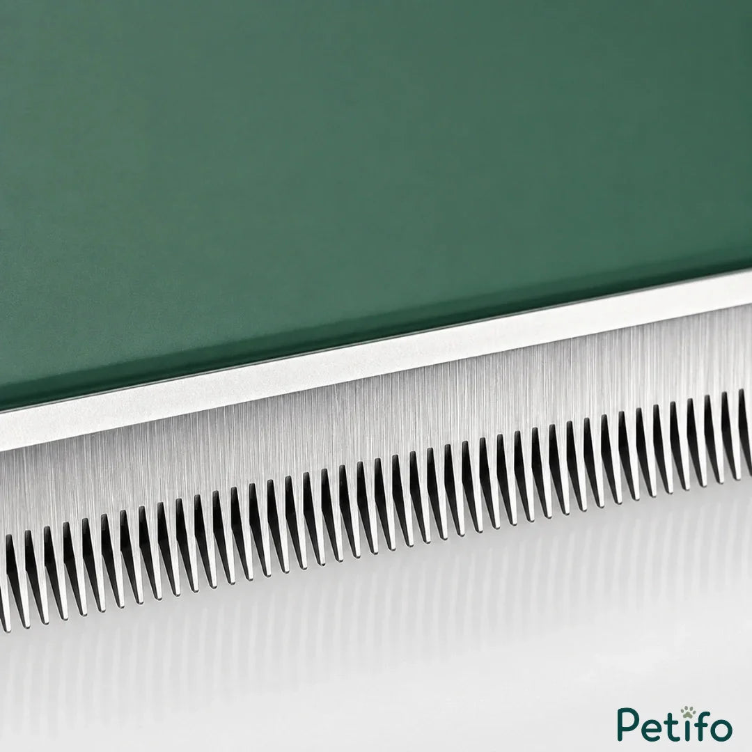 Macro close-up shot highlighting the fine, durable stainless steel teeth of the green pet grooming comb.