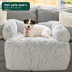 Large grey Petifo pet sofa bed placed on a living room couch with a small dog sitting on it.