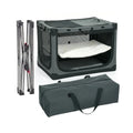 Foldable grey dog crate shown assembled alongside its collapsible metal frame and matching travel carry bag.