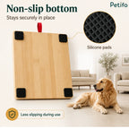 Underside view of the bamboo scratch board displaying its four non-slip silicone pads.