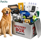 Petifo Platinum luxury pet mystery box overflowing with toys and grooming tools next to a golden retriever.