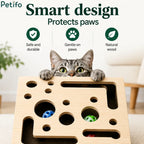 Cute close-up of a tabby cat peering over the top of the wooden activity box next to paw-friendly design highlights.