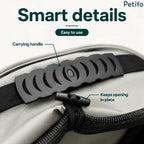 Close-up detail view of the ergonomic carrying handle and secure mesh opening fastener.