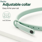 Petifo mint green adjustable silicone cat collar shown on a white surface, highlighting its easy fit and multiple sizing holes.