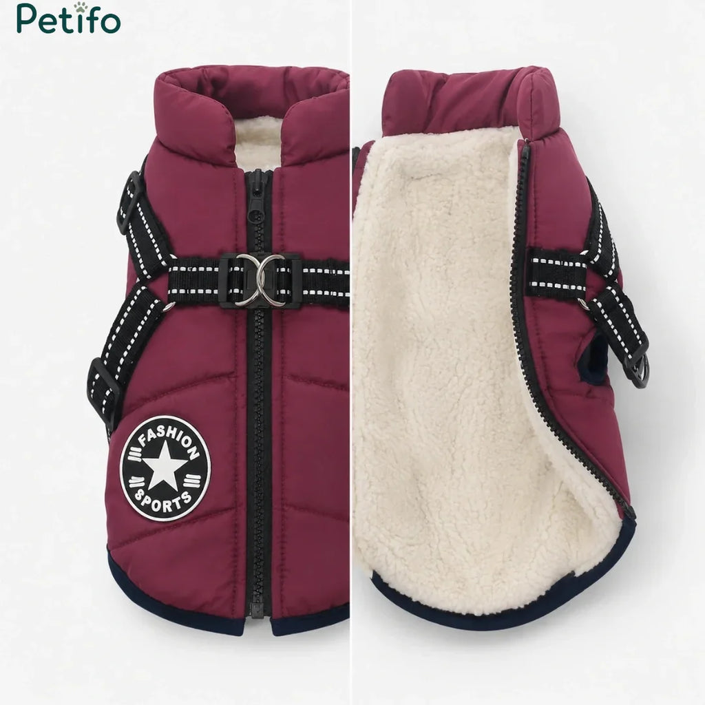 Wine red winter dog coat displaying the outer shell zipper and soft inner fleece lining.