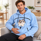 Blue Fluffelia hoodie used with a cat on a sofa - Petifo