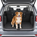 Dog behind the installed PawHut Adjustable Car Barrier in an estate-car boot - Petifo